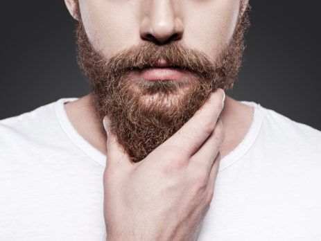 touching his perfect beard.