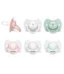 Chupetes con tetina anatómica de silicona que imita la forma del pezón materno durante la succión, adaptándose perfectamente al paladar.